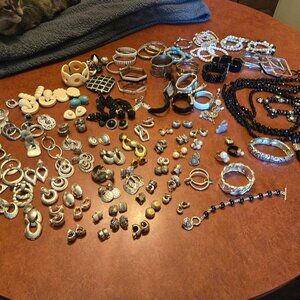 Bundle of costume jewelry . Earings, bracelets, necklaces watches and more